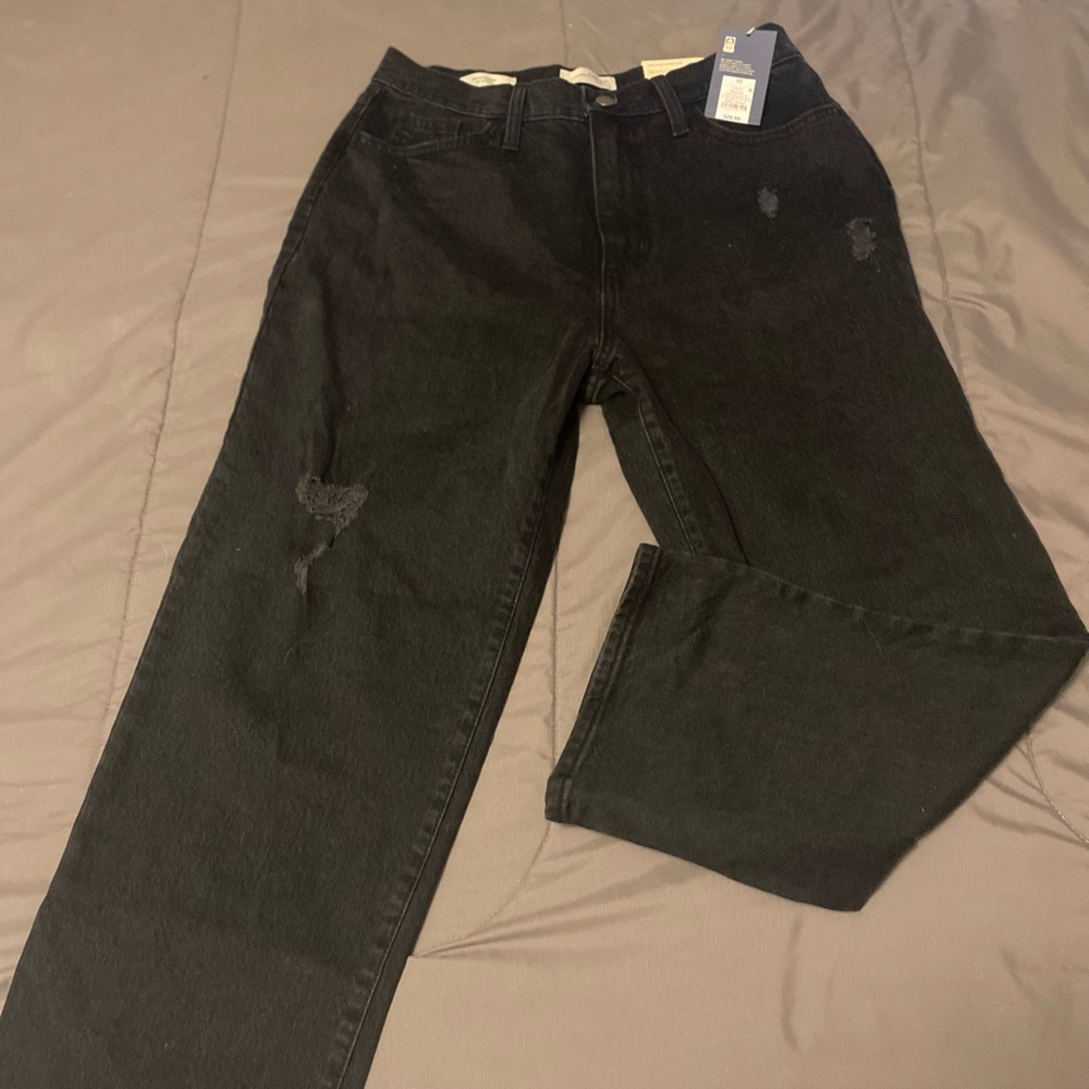 Universal thread never worn black jeans with tags